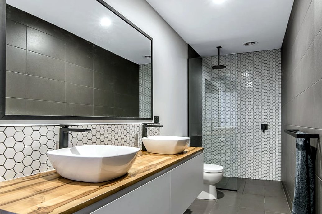 Fort Direction bathroom, hexagonal white mosaic, timber vanity, black tapware