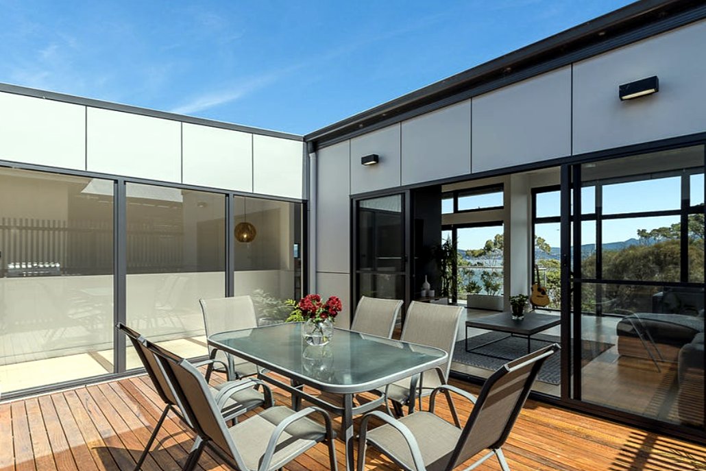 Fort Direction sheltered courtyard deck between living and bedroom wings