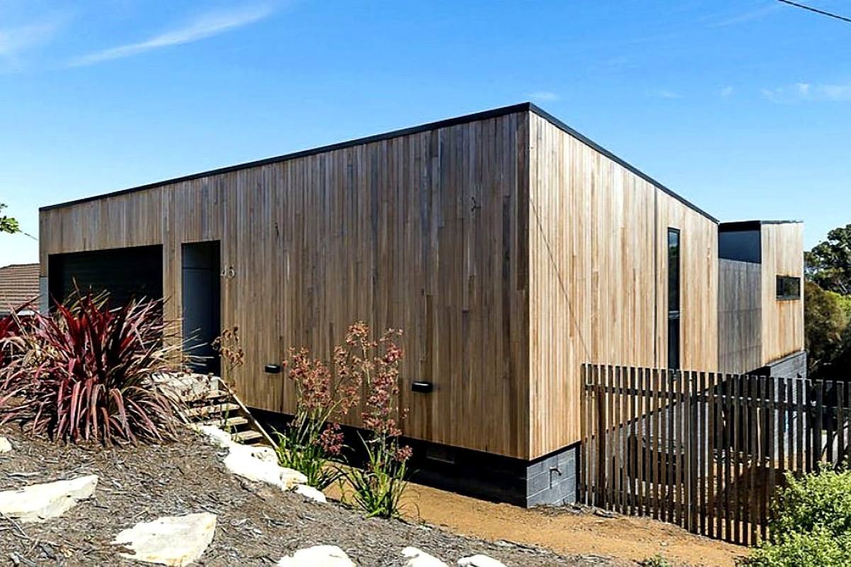 Fort Direction new residence, silvertop ash cladding above dark blockwork base, built by LHPL Contracting
